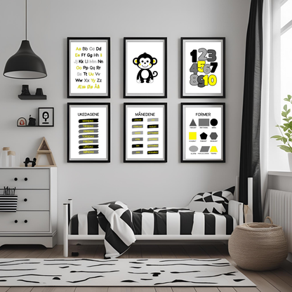 Seks plakater i serien svart/gul hengende på vegg innrammet på barnerom