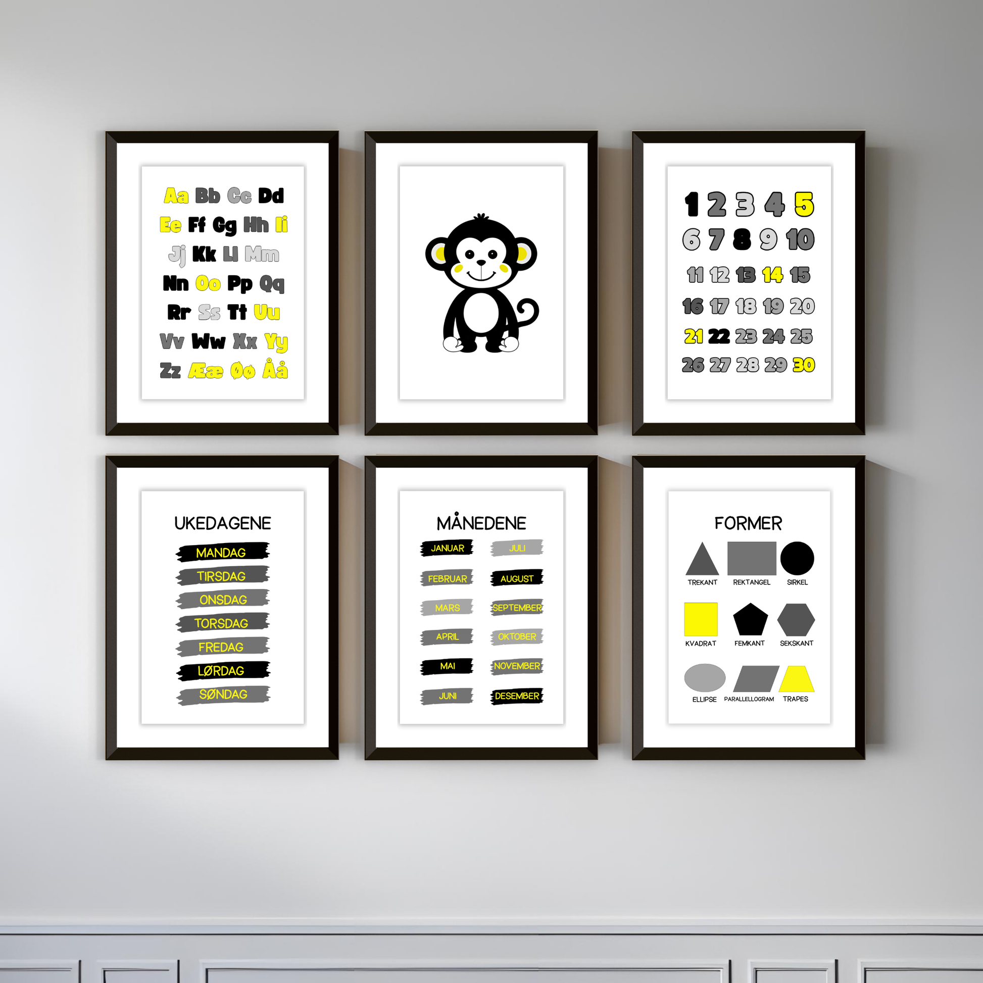 Seks plakater i svart/gul-serien hengende på vegg innrammet.